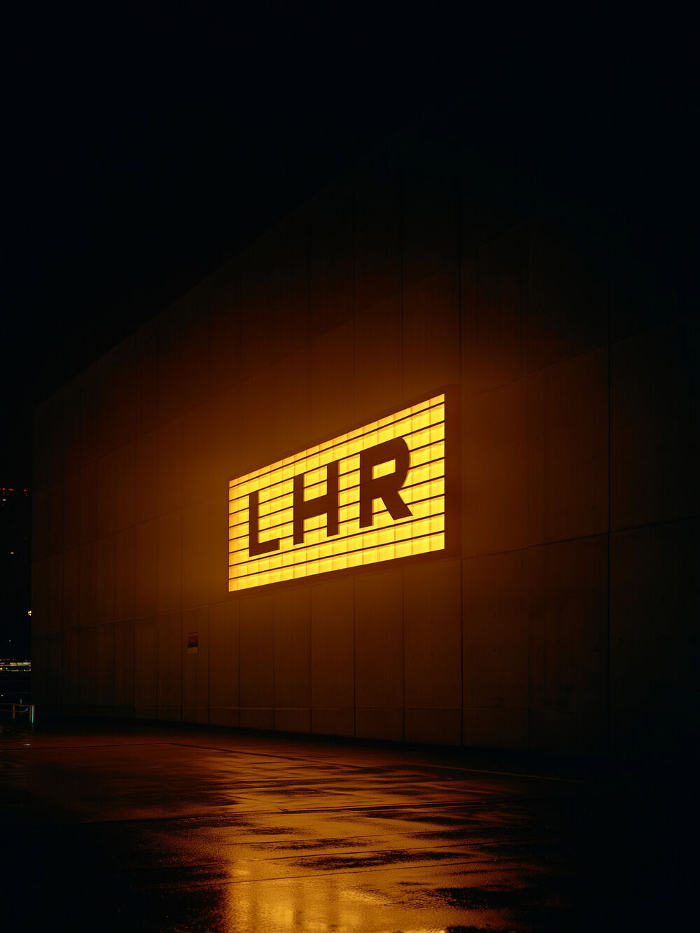 LHR lightbox sign at night